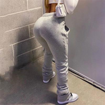 China Free Sample Autumn Solid Color Breathable Elastic High Waist Pleated Drawstring Plus Size Pants Women Sweatpants Stacked Pants for sale