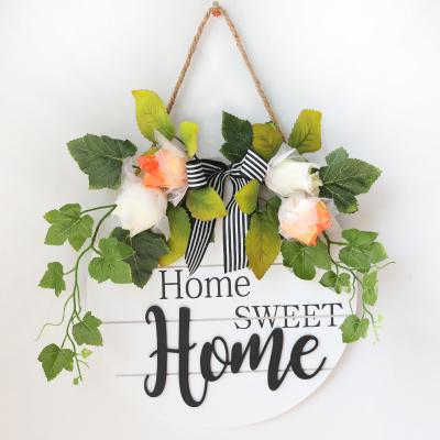 China Cheap artificial decoration vendors plant around welcome sign wooden door wreath hanging home decoration for sale