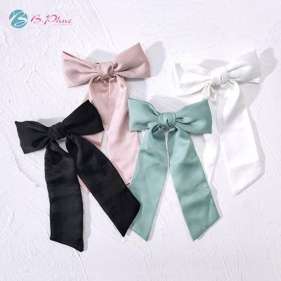 China Black Pink Hair Decoration New Products Bow Knot Hair Clip Girls Satin Spring Sling Hair Bow Clip for sale