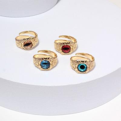 China Hot Selling Hiphop Stylish Adjustable Eye Gold Plated Rings Exaggerate Luxury Jewelry Hip Hop Unisex Drip Oil Rings for sale