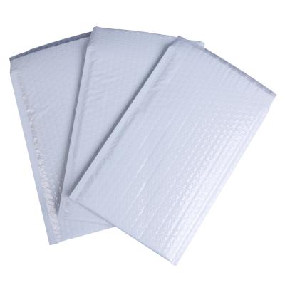 China Good Quality Strong Shock-Resistance Adhesive Craft Glitter Metallic Foil Cushioned Bubble Mailers for sale