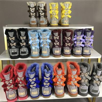 China Fashion Trend Drop Winter Shipping Shoes New Sheepskin Bows Bling Fur Snow Boots Women's Large Size Rhinestone Uggh Snow Boots For Woman for sale