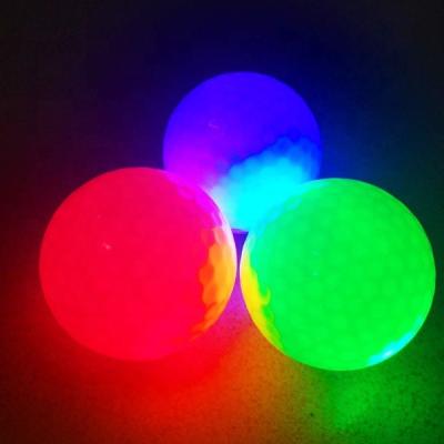 China Core+surlyn rubber cover with LED cells glow in the dark golf balls light up led golf balls for sale