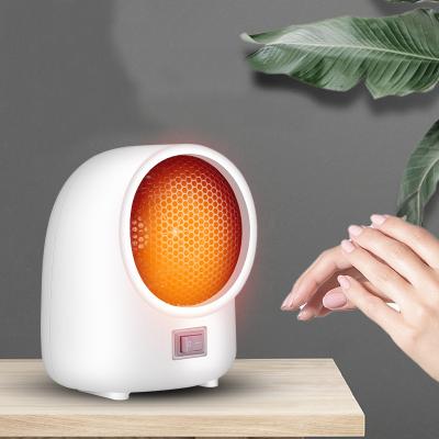 China 2022 Hot Selling Mini Portable Ceramic 400w Energy Saving Home PTC Fan Room Table Desk Outdoor Electric Hand Heaters for sale