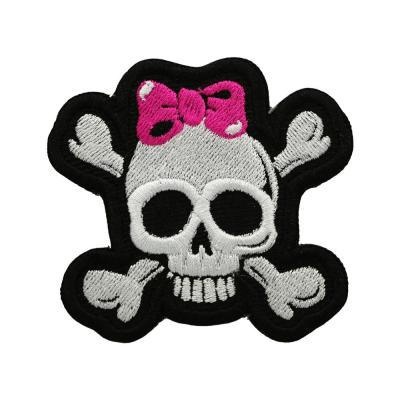 China Viable Bone Girls Skull Cross Bow Sew-on Backing Embroidered Laser Cut Border Embroidery Patch Wholesale for sale