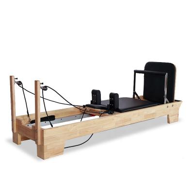 China Home Pilates Machine Pilates Reformer Wooden Maple Beech Maple Wood Pilates Reformer Equipment White Prices Home Pilates Machine for sale