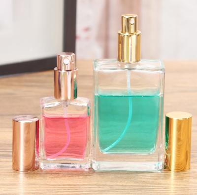 China Personal Care Beauty Perfume Press Spray Glass Hot Selling Clear Perfume Bottle for sale