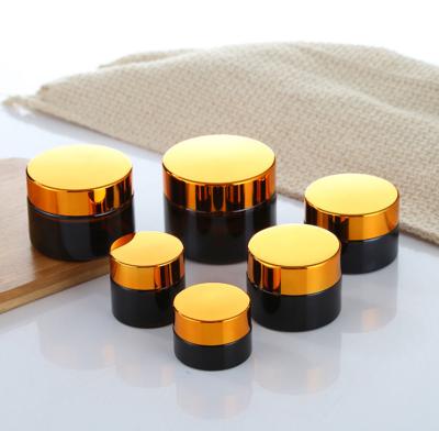 China Hot Sale Cosmetic Reusable Cosmetic Glass Packaging Amber Cream Jar With Lid for sale