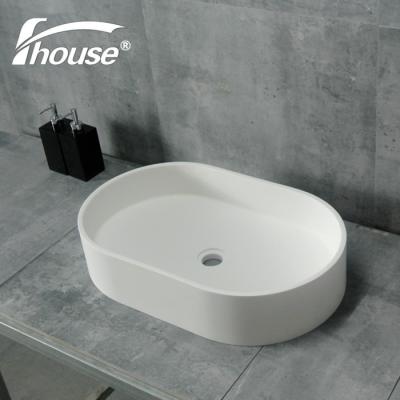 China OUTDOOR SOLID SINK OVAL SHAPE RESIN BASIN STONE SINK for sale