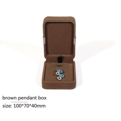 China Recycled materialss wholesale brown velvet jewelry packaging earring gift box with knot bow tie for sale