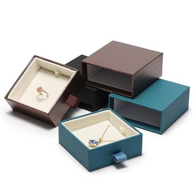 China Recycled materialss customize drawer cardboard blue chocolate leather jewelry packaging box with velvet for sale