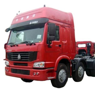 China 375hp 420hp euro 2 used truck and full new howo tractor sinotruk howo diesel tractor truck 6800*2496*3668 for sale