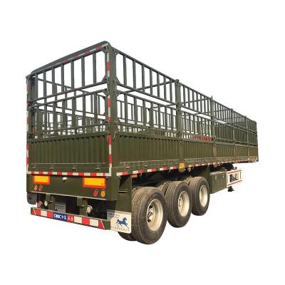 China Medium and long distance goooseneck barrier semi trailer side wall stake side barrier heavy bulk trailer side wall barrier semi trailer for sale