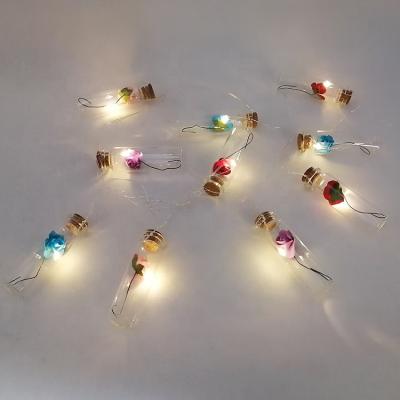 China Artificial Dry Flower Mini Glass Bottle String Light Home Decor 10 LED Solar Powered Outdoor Decorative String Lights for sale