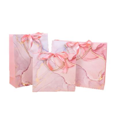 China High Quality Recyclable Pink Shopping Gift Bag Luxury Accept Customized Logo Gift Bag With Ribbon Handle for sale