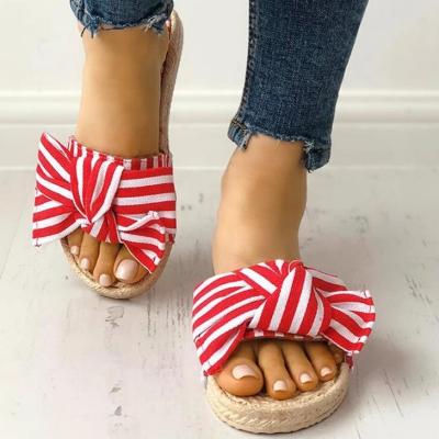 China Fashion Trend Flat Slippers For Women Bow Faux Straw Sandal Style With Bowknot Summer Slipper Ladies Shoes Sandals for sale