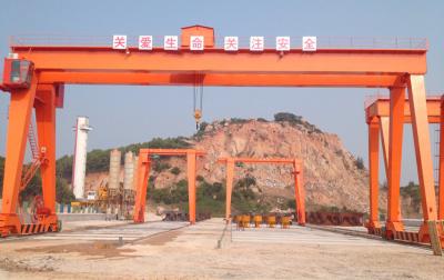 China 100KN - 3000KN Double Girder Gantry Crane 25 Ton Mobile Outdoor Steel Coil Lifting for sale