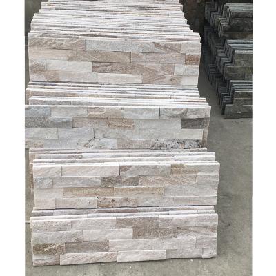 China Modern line beige split face gold natural quartz stacked stone wall cladding panels for inteior fireplace for sale