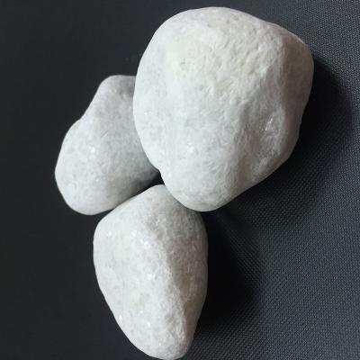 China Modern Natural Marble Snow White Tumbled Stone Granite Pebbles Cobblestone For Decorative Garden Landscaping for sale