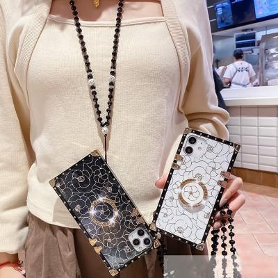 China Pro Max Shockproof Luxury iPhone 13 Flower Stand Silicone Cover Crystal Chain Shell Diamond Ring Phone Case For for sale