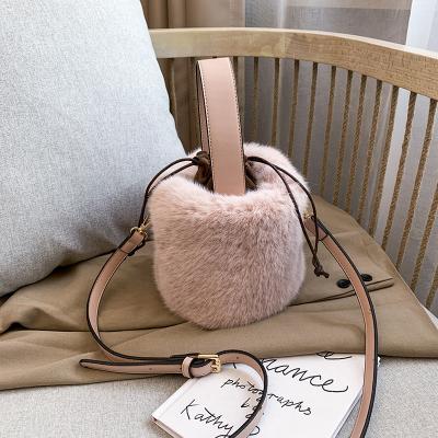 China Winter Fashion Faux Fur Bags Women Plush Casual Bucket Bag Warm Large Capacity Shoulder Handbag for sale