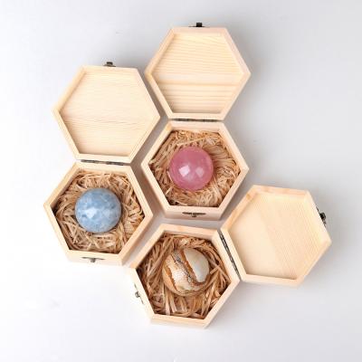 China Decoration crystal ball wooden box gift box natural raw stone polished home furniture, energy decorative stone for sale