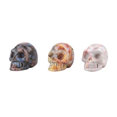 China Decoration Hand-carved feng shui decoration semi-gemstone ghost head charm skull crystal handwork decoration for sale