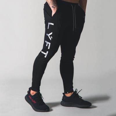 China Casual Jogger Anti-pilling Fitness Anti-pilling Fashion Pants New Trousers Men Printed Muscle Cargo Sports Tracksuit for sale