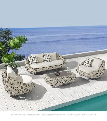 China 100% hand - modern simple combination garden chair combination outdoor table and rattan furniture balcony rattan woven outdoor chair for sale