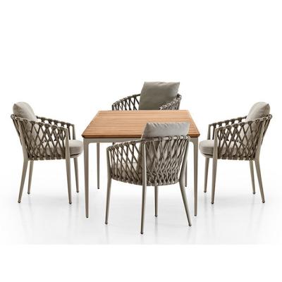 China Modern woven outdoor dining table and synthetic rope chairs set outdoor modern furniture for sale