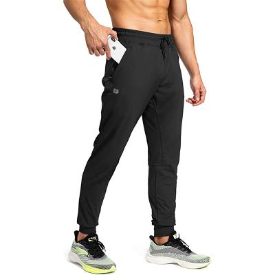 China Men Running Fitness Pants Anti-Wrinkle Sports Quick Dry Sweatpants With Zipper Pockets AthleticTraning Track Pants Joggers Football for sale