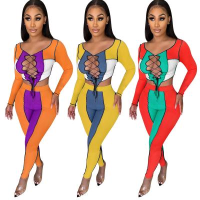 China 2022 New Arrivals Breathable Fashion Women Hollow Out Drawstring Irregular Crop Long Pants 2 Pieces Color Set Patchwork Ribbed Tracksuit for sale