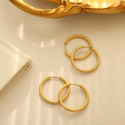 China Luxury earrings romantic titanium circle wire temperament fashion sense steel gold plated light luxury earrings for sale