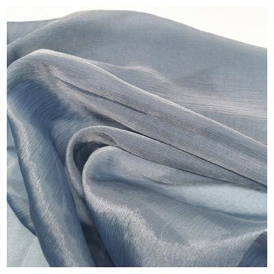 China Breathable Organza Crepe Fabric 44% Polyester 56% Nylon Silver Yarn Soft Shiny Organza Fabric For Garment for sale