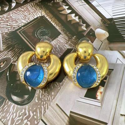 China Environmental Friendly French Blue Peacock Moon Colored Retro Female Chandelier Stud Earrings Gold Niche Design Earrings For Women for sale