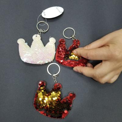 China Ornament Promotion Gift Capsule Toys Keychains Magic Glitter Key Chain Crown Shaped Sequin Key Ring For Kids for sale