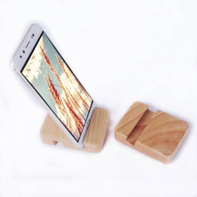 China Promotion\Business\School Beech Solid Wood Base\Creative Cell Phone Stand Desk Processing Customized Cell Phone Socket for sale