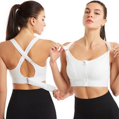 China Body Sculpting Logo Assorted Colors Women Sexy Loose Fitted Tank Tops Racerback Yoga Sports Custom Made Wholesale for sale