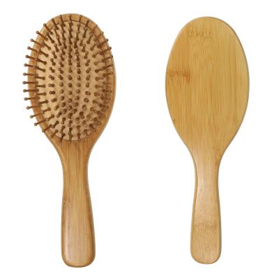 China Eco-friendly Wooden Cushion Paddle Hair Brush Bamboo Stiffens Detangling Natural Hair Brush for sale