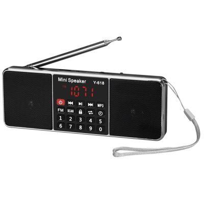 China Hot sale portable mini fm radio usb dual channel speaker with led flashlight for sale