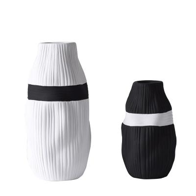 China Modern Nordic Minimalist Irregular Black and White Vase Matte Ceramic Ceramic Home Decoration 2023 Ceramic Ware Vases for sale