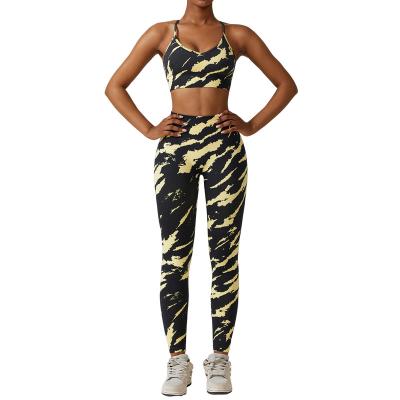 China Breathable Colorful printed seamless yoga suit set with quick drying, high waisted running, fitness, and tight fitting exercise set for sale