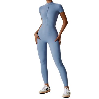 China Breathable Bestselling Zipper Short Sleeve Nude Yoga Bodysuit for Women Outerwear Fitness Yoga Sports Bodysuit for sale