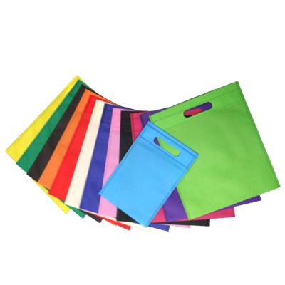 China Wholesale Eco-Friendly Recycle Multicolor Gift Packaging Bag Custom Logo Non Woven Bag D Cut for sale