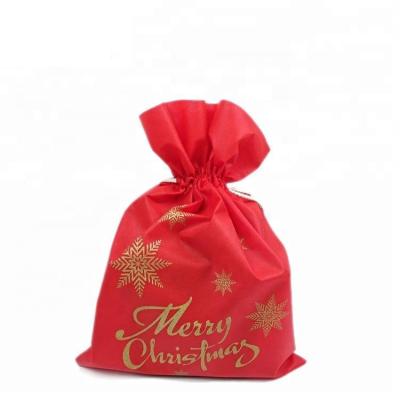 China Personalized Christmas Gift Drawstring Eco-Friendly Non Woven Bags Custom Design For Kids for sale