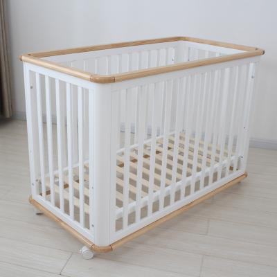 China Exclusive Design Mobile Wooden Nursery Furniture Baby Crib Hutch With Casters for sale