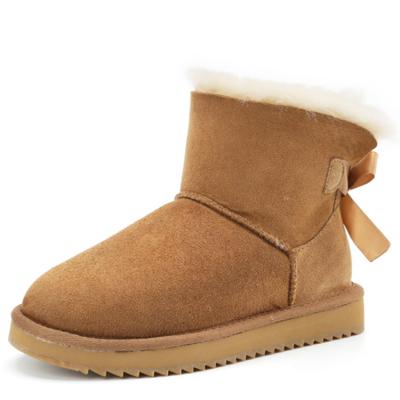 China Wholesale Fashion Round Winter Women's Sheepskin Shoes Moulti Color Women Winter Snow Boots Lambs Wool Fur Boots With Bows A for sale