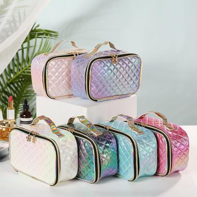 China Portable Fashion PU Lattice Fashion Women Makeup Case Laser Lattice Cosmetic Bags Toiletry Bag For Women for sale