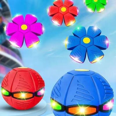 China Sports Toys 2022 Hot Sale Flying UFO Throw Disc Flat Ball With LED Light Toy Bounce Saucer Deformation Football Outdoor Sports Ball Toy for sale