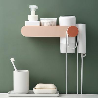 China 2021 Hot Sale New Design Bathroom Vanity Bedrooms Sustainable Adhesive Wall Mounted Hair Dryer Holders Storage Racks for sale